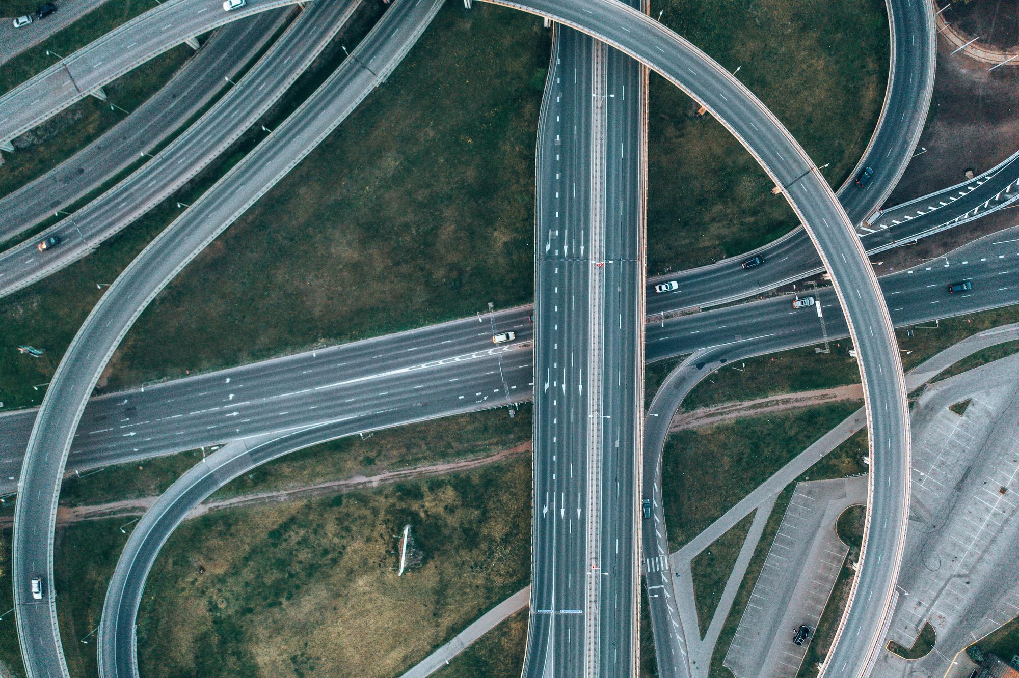 aerial-view-highways-with-overpass-intersections_181624-55025 aerial-view-highways-with-overpass-intersections_181624-55025
