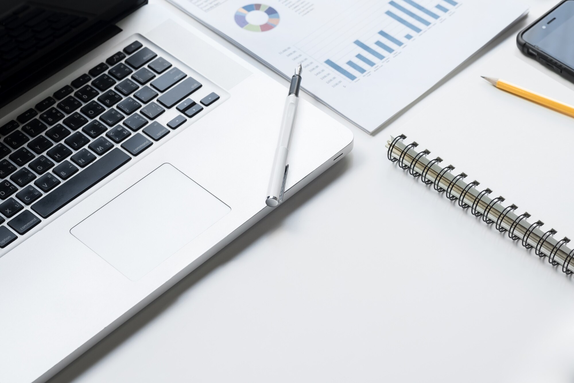 business-desk-with-keyboard-report-graph-chart-pen-tablet-white-table_1423-249 business-desk-with-keyboard-report-graph-chart-pen-tablet-white-table_1423-249
