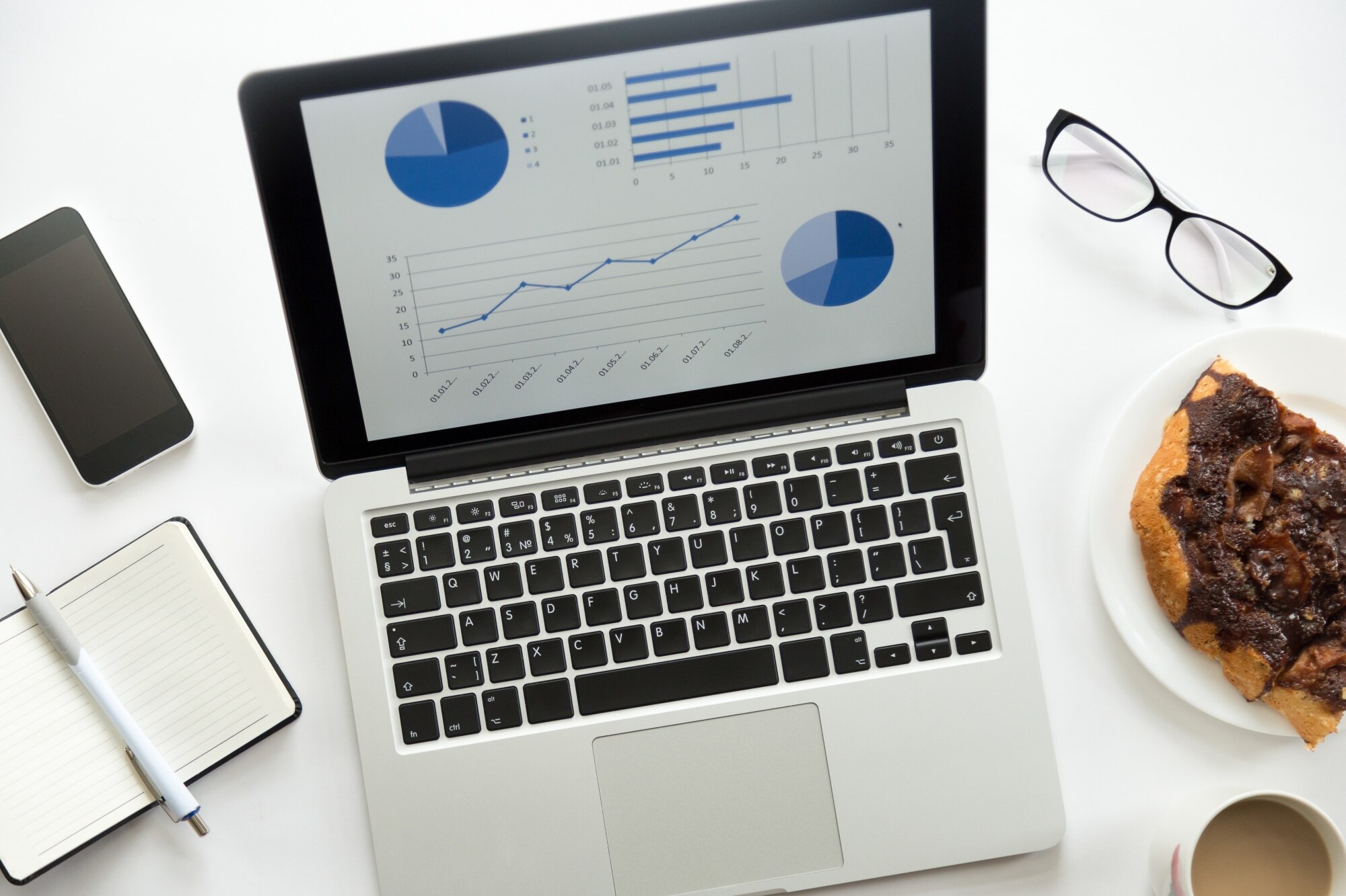 open-laptop-with-diagram-glasses-mobile-office-supplies open-laptop-with-diagram-glasses-mobile-office-supplies